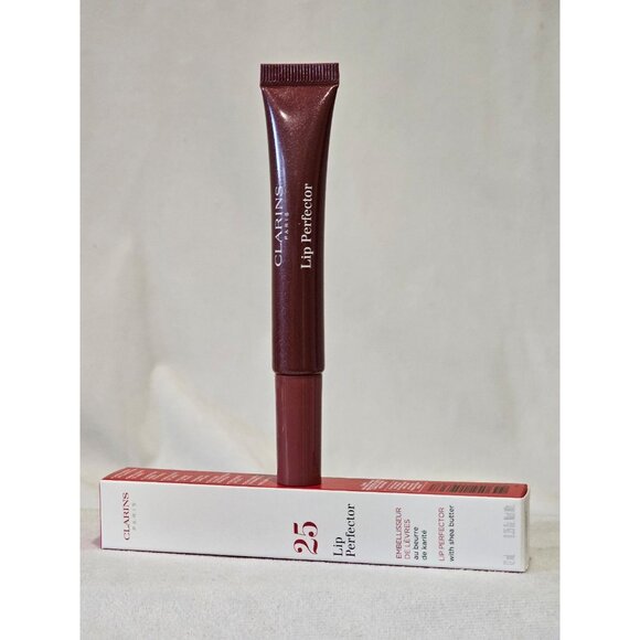 Clarins Lip Perfector 25, a lip-plumping gloss with a sheer finish. - Picture 1 of 3